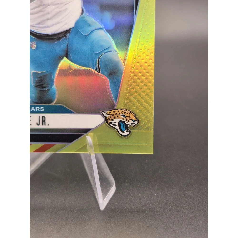 2024 Panini Prizm Travis Etienne Jr. #130 Red & Yellow Prizm /44 Jaguars